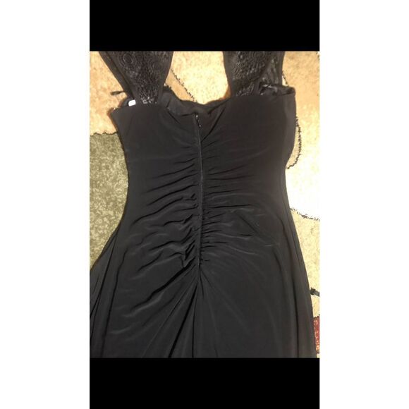 Turn heads with this R & M Richards black cap sleeve beaded gown.Retail $149.00 - Picture 10 of 16